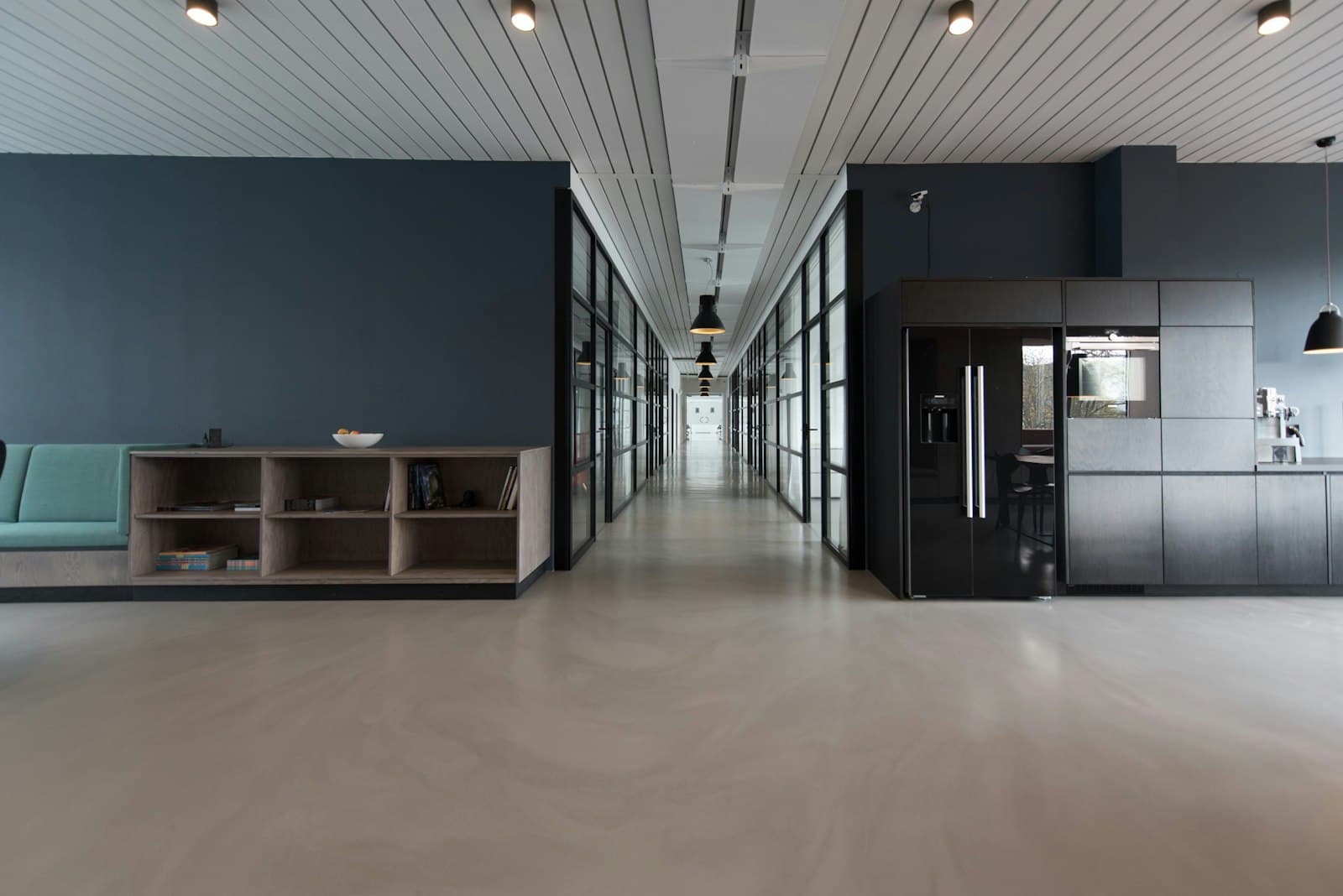 Clean, modern open-plan office corridor